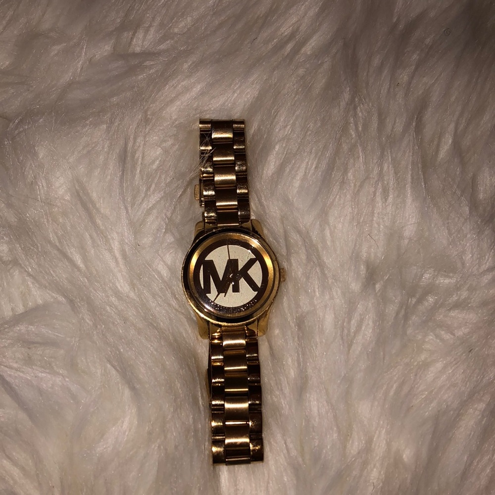 Gold MK watch